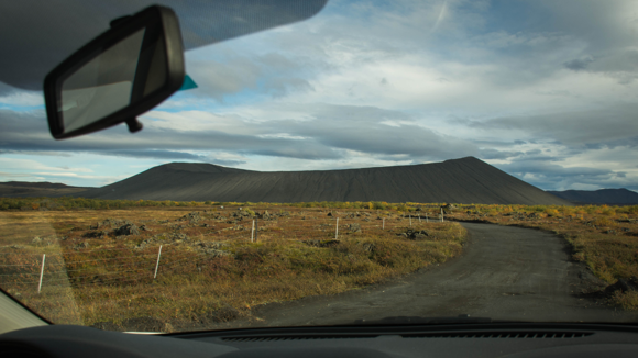 View of Hverfjall from a car approaching the volcano