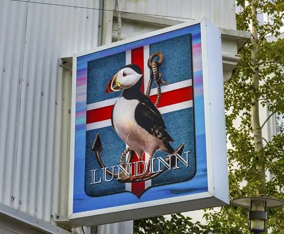 Puffin sign for Lundinn, a gift shop in Reykjavík.