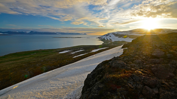 Midnight sun in Iceland, which can be seen from the Drangajökull glacier