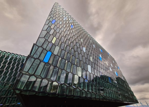 View of Harpa Concert Hall from outside against a grey sky