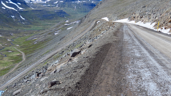 Steep and gravel road without barriers up to Bolafjall summit 