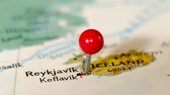 A red pin on a map showing Reykjavík.