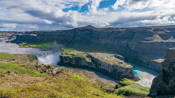 Aerial shot of Hafragilsfoss on a sunny day.