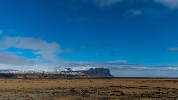 Blue sky and low-level cloud over Kálfafell, Iceland