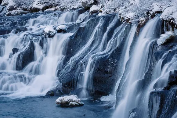 Hraunfossar waterfall during winter.