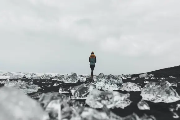 Woman walking on Diamond Beach