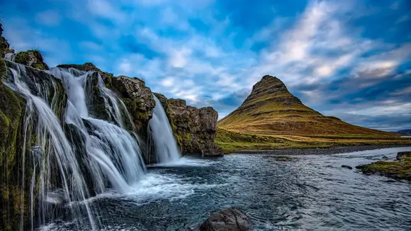 Kirkjufell Mountain in Iceland surrounded by waterfalls.